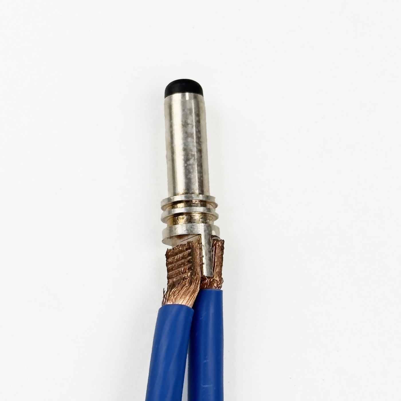 Ultrasonic weld sample: twisted copper strands fused into one